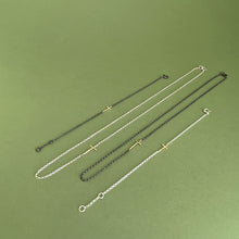 Load image into Gallery viewer, Gold cross necklace - oxidised