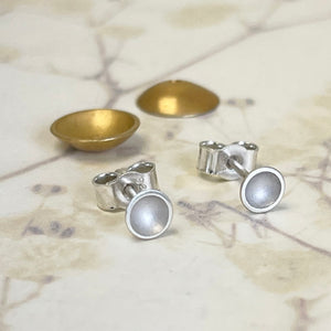 Silver and gold stud earrings