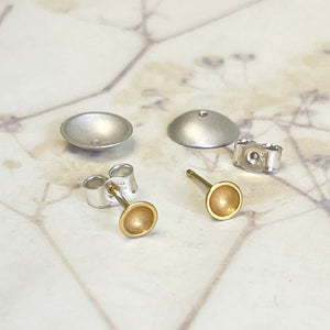 Gold and silver stud earrings