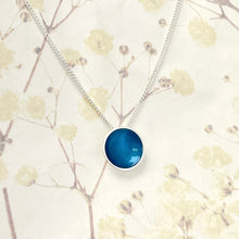 Load image into Gallery viewer, Silver and kingfisher blue halo necklace.
