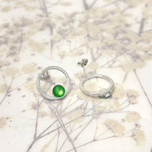 Load image into Gallery viewer, Silver and grass green stud earrings.
