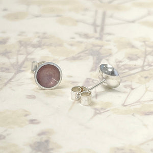 Silver and pale pink enamel studs