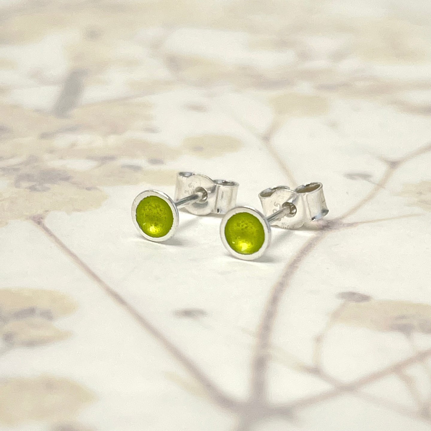 Silver and lime green enamel dainty studs