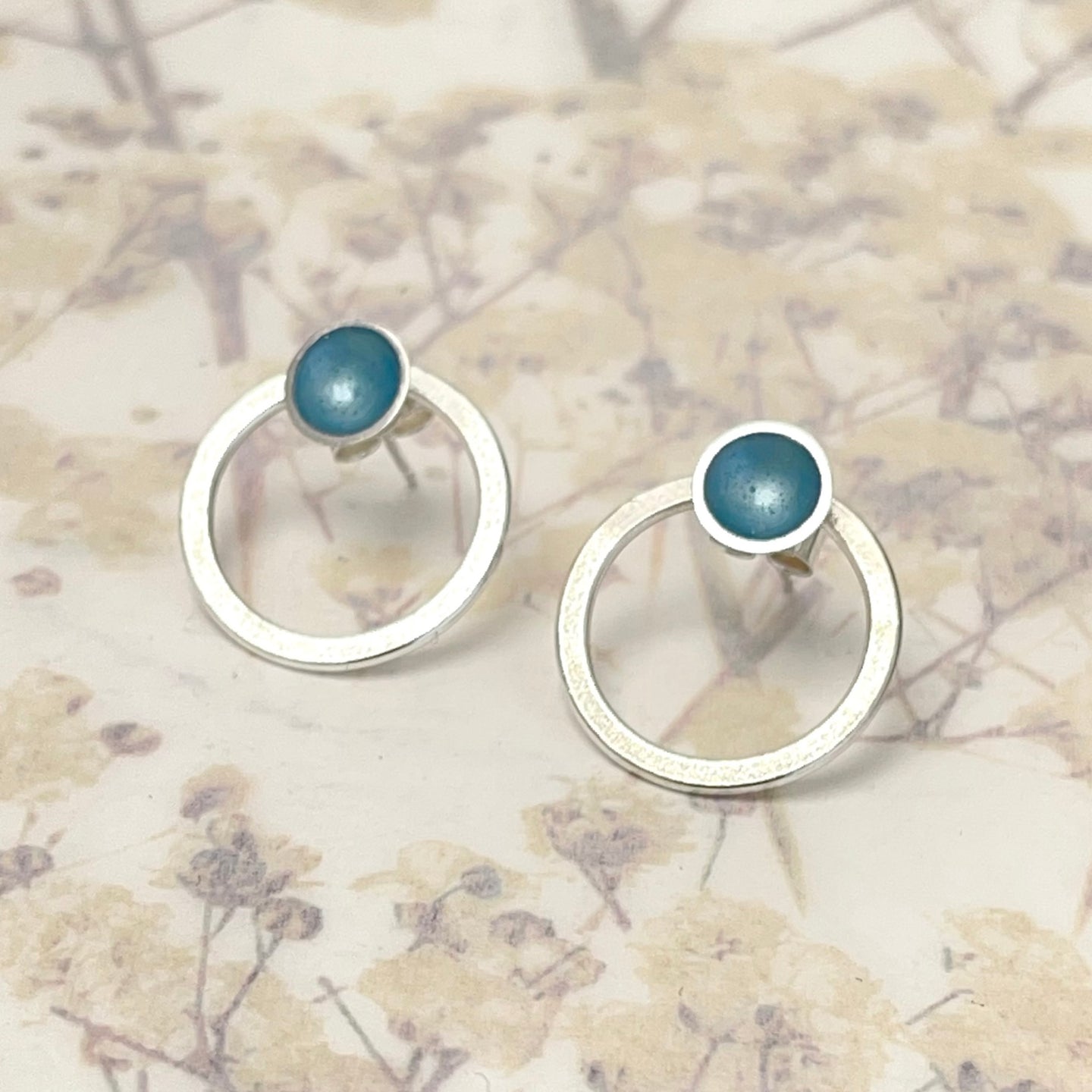 Silver and ice blue studs