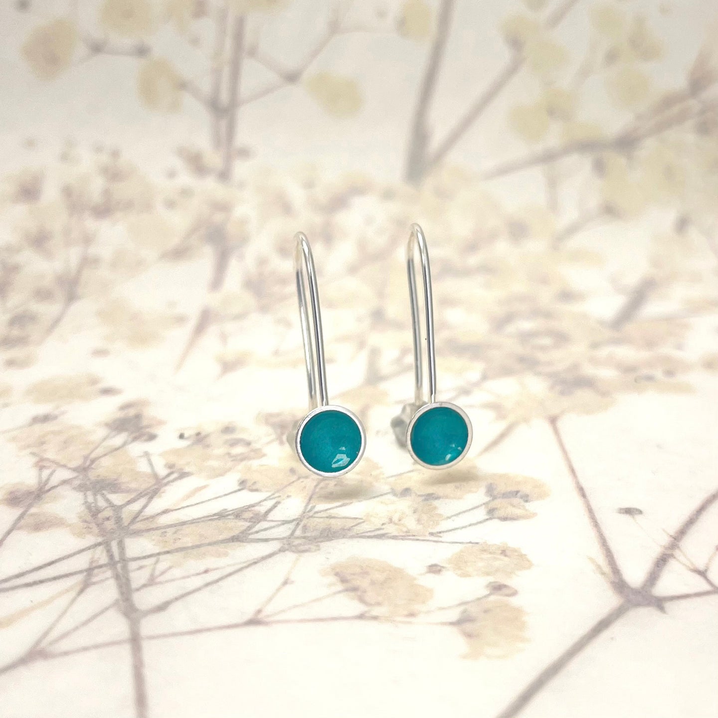Silver and teal drop earrings
