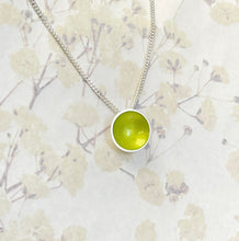 Load image into Gallery viewer, Silver and lime green halo disc necklace

