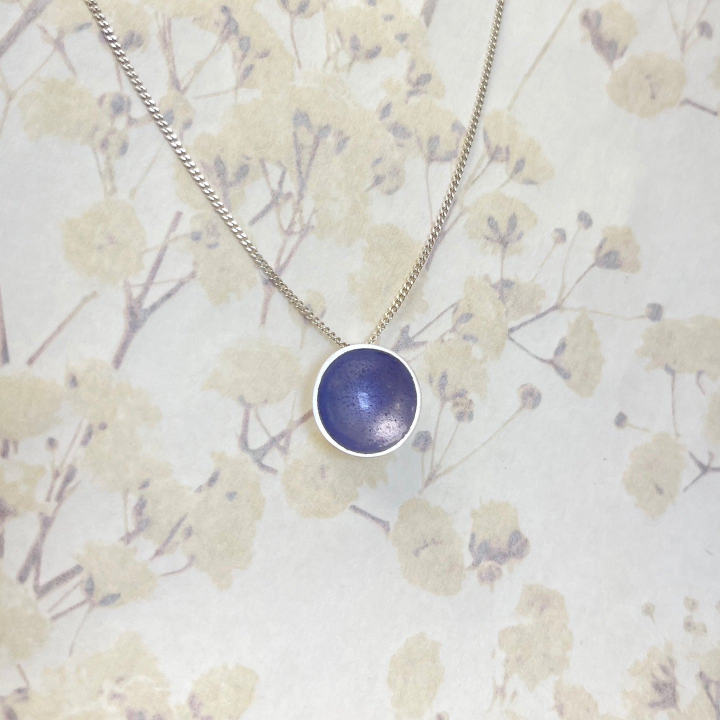 Silver and purple halo disc necklace
