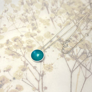 Silver and teal halo disc necklace