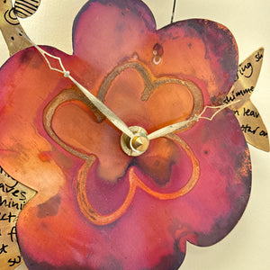 Clock with humming bird