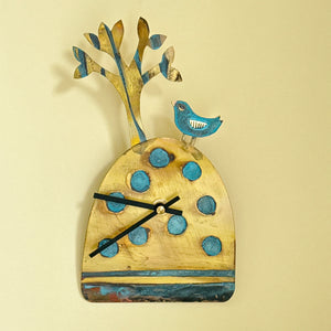 Clock with bird and tree