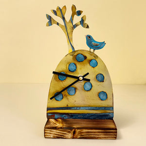 Clock with bird and tree