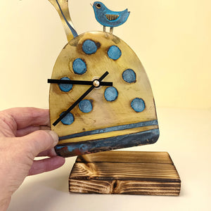 Clock with bird and tree