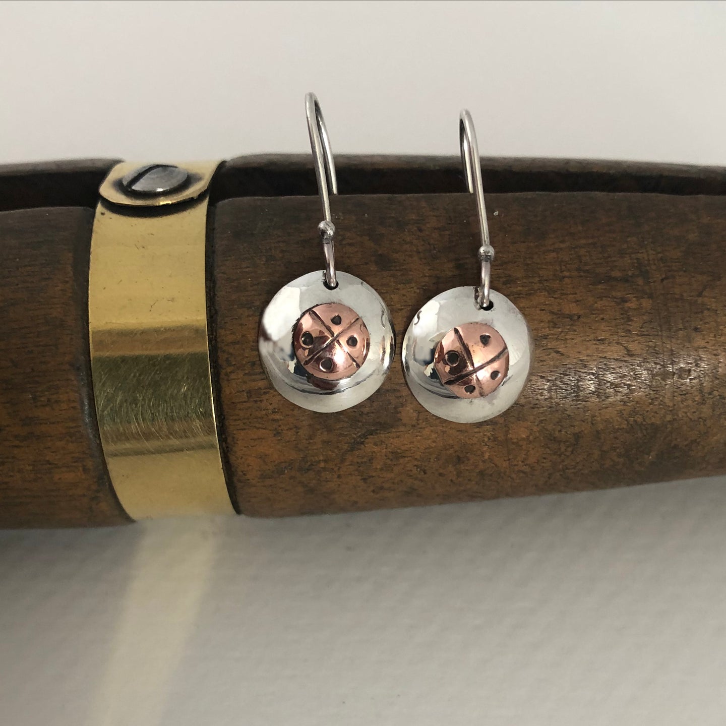 Silver and copper domed earrings
