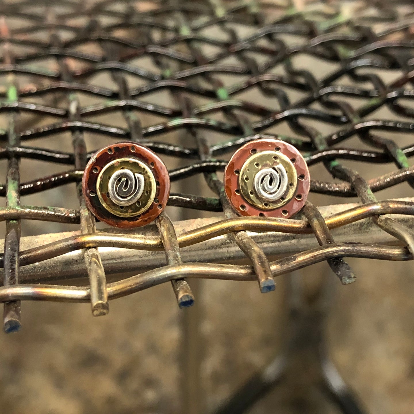 Punch stud earrings
