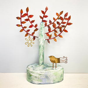 Copper tree with bird sculpture