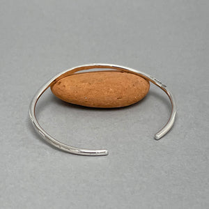 Open silver bangle - gold heart