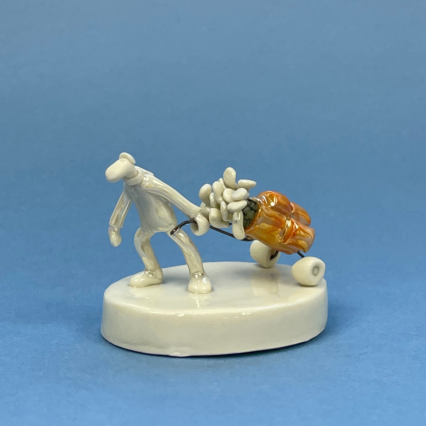 Ceramic sculpture - golfer on the links