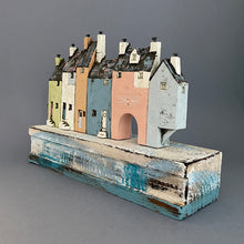 Load image into Gallery viewer, Ceramic row of houses.
