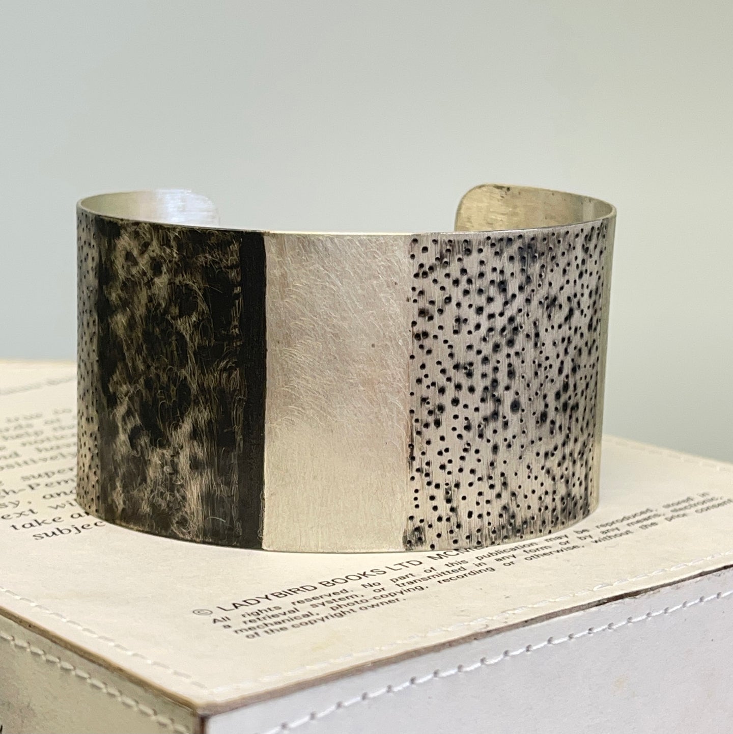 Wide silver cuff bangle