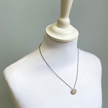 Load image into Gallery viewer, Small silver disk pendant 1
