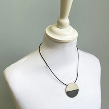Load image into Gallery viewer, Medium silver disk pendant 2
