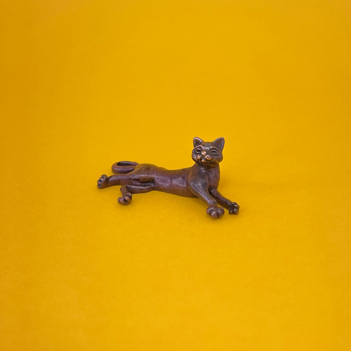 Lying Cat miniature bronze sculpture
