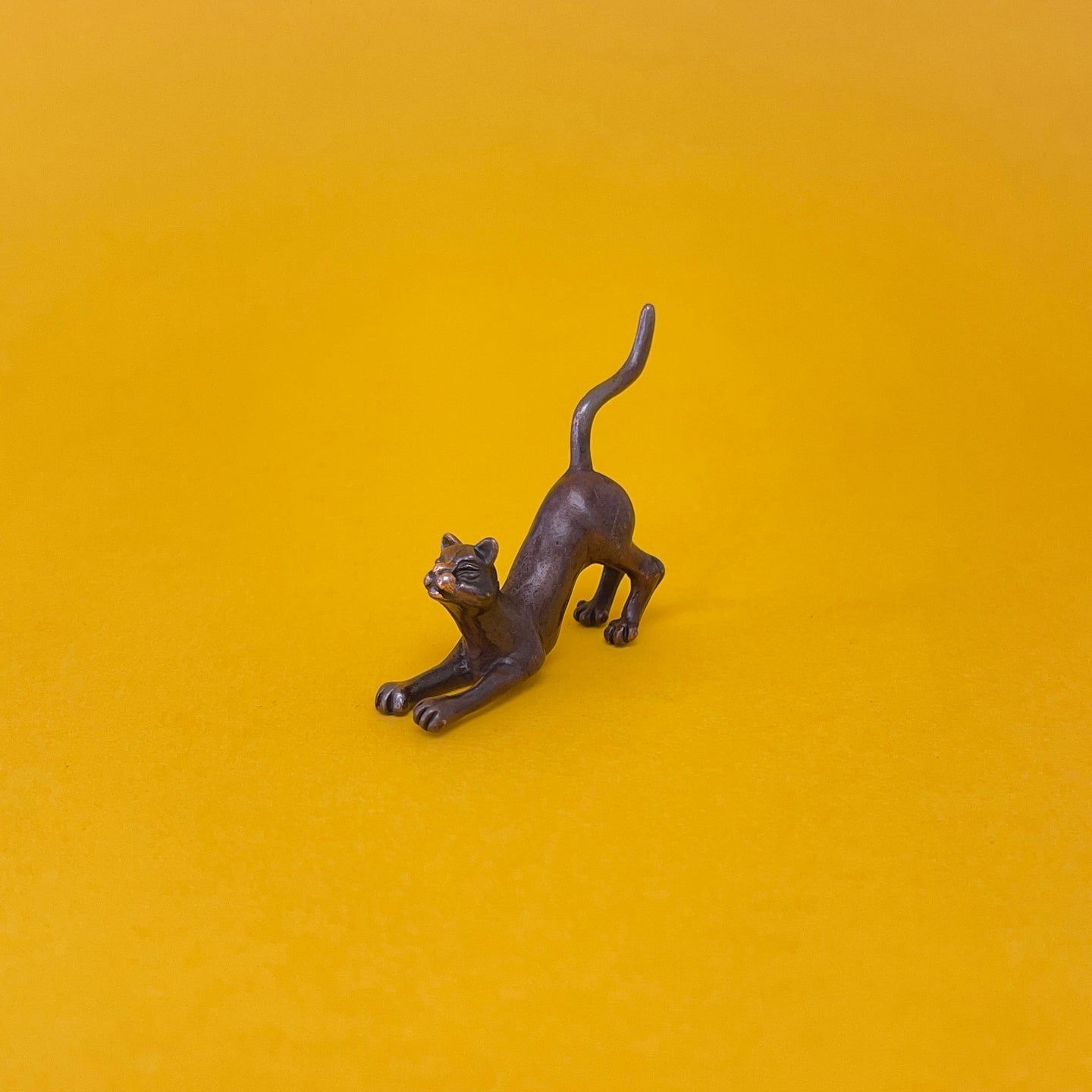 Stretching Cat miniature bronze sculpture
