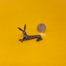 Load image into Gallery viewer, Lying Hare miniature bronze sculpture
