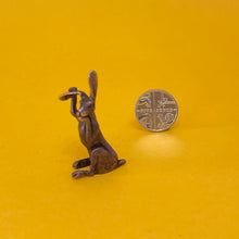 Load image into Gallery viewer, Washing Hare miniature bronze sculpture
