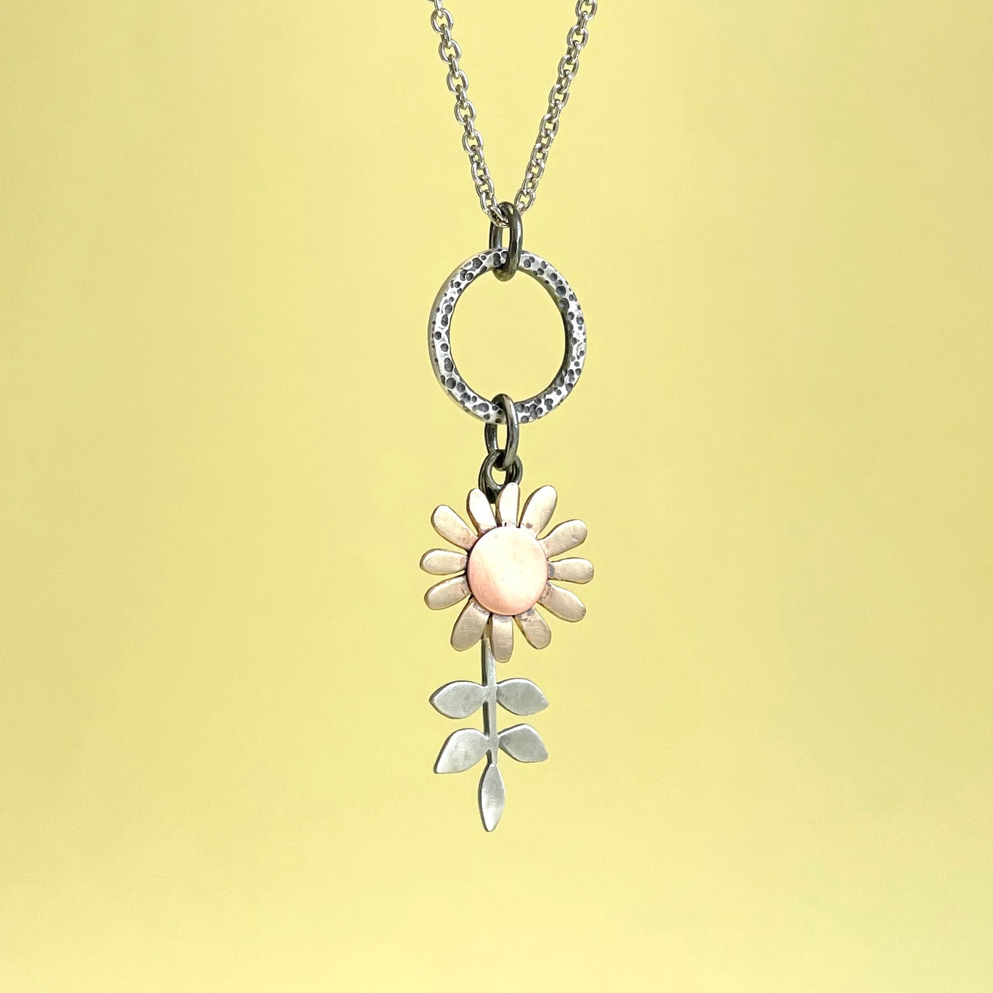 Bronze, copper and silver sunflower pendant