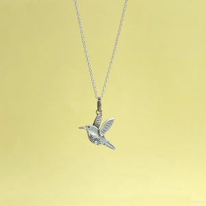 Silver humming bird pendant