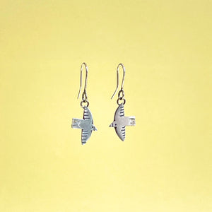 Silver flying bird drop earrings