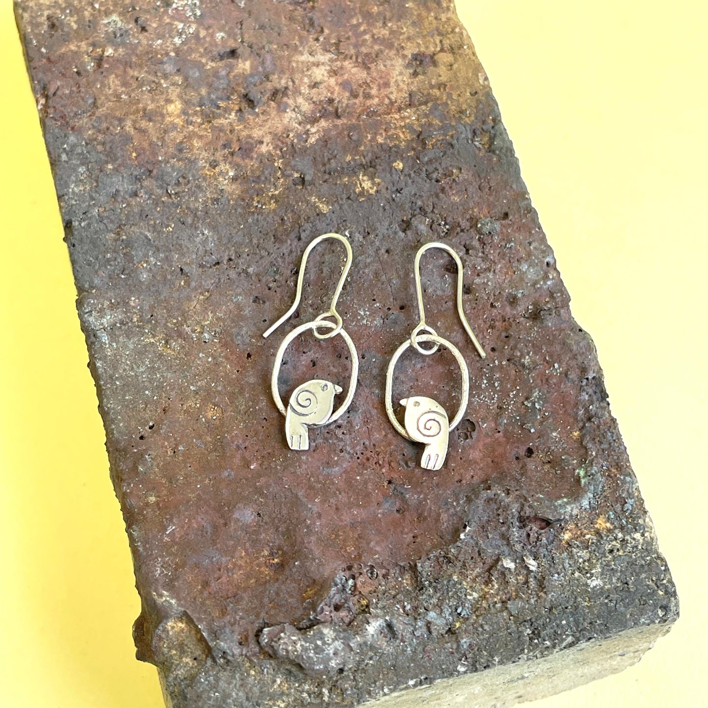 Silver bird with spiral drop earrings