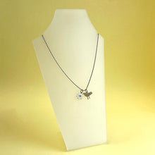 Load image into Gallery viewer, Bronze bird, silver flower pendant
