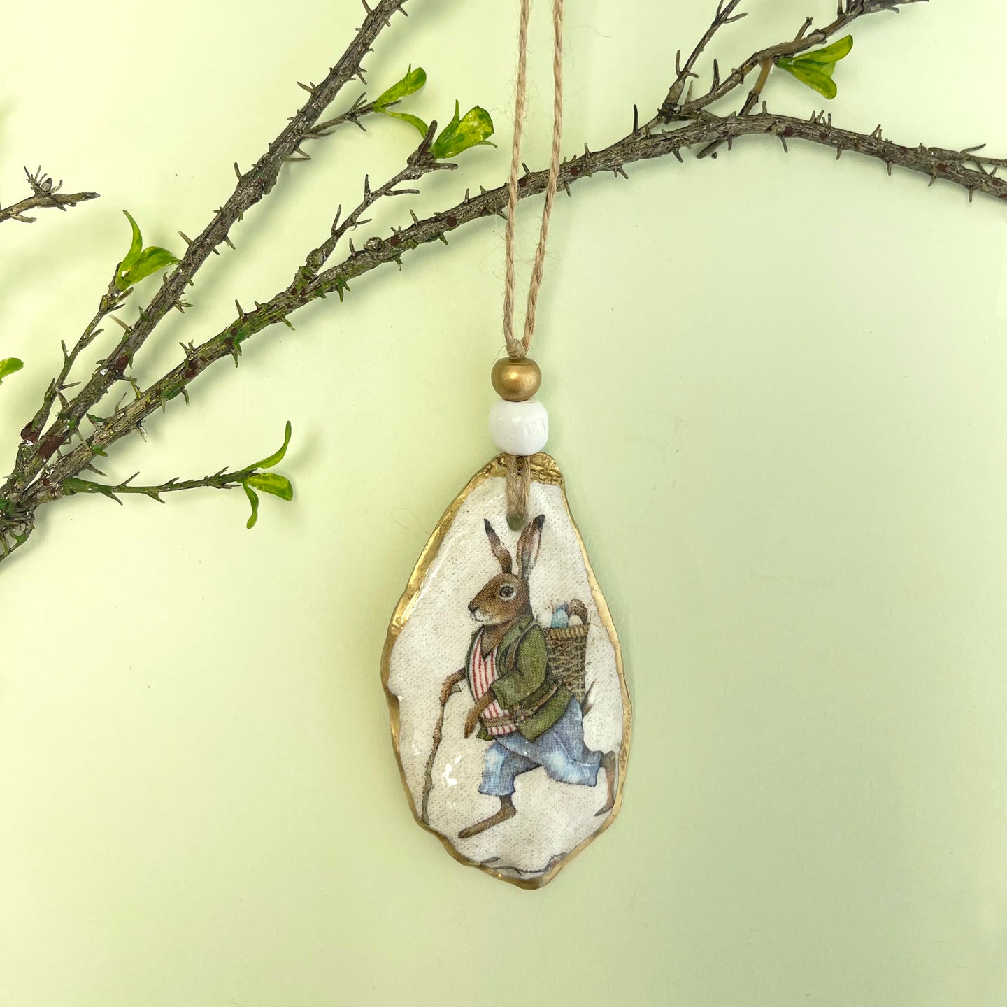 Oyster shell wall hanging - rabbit and eggs