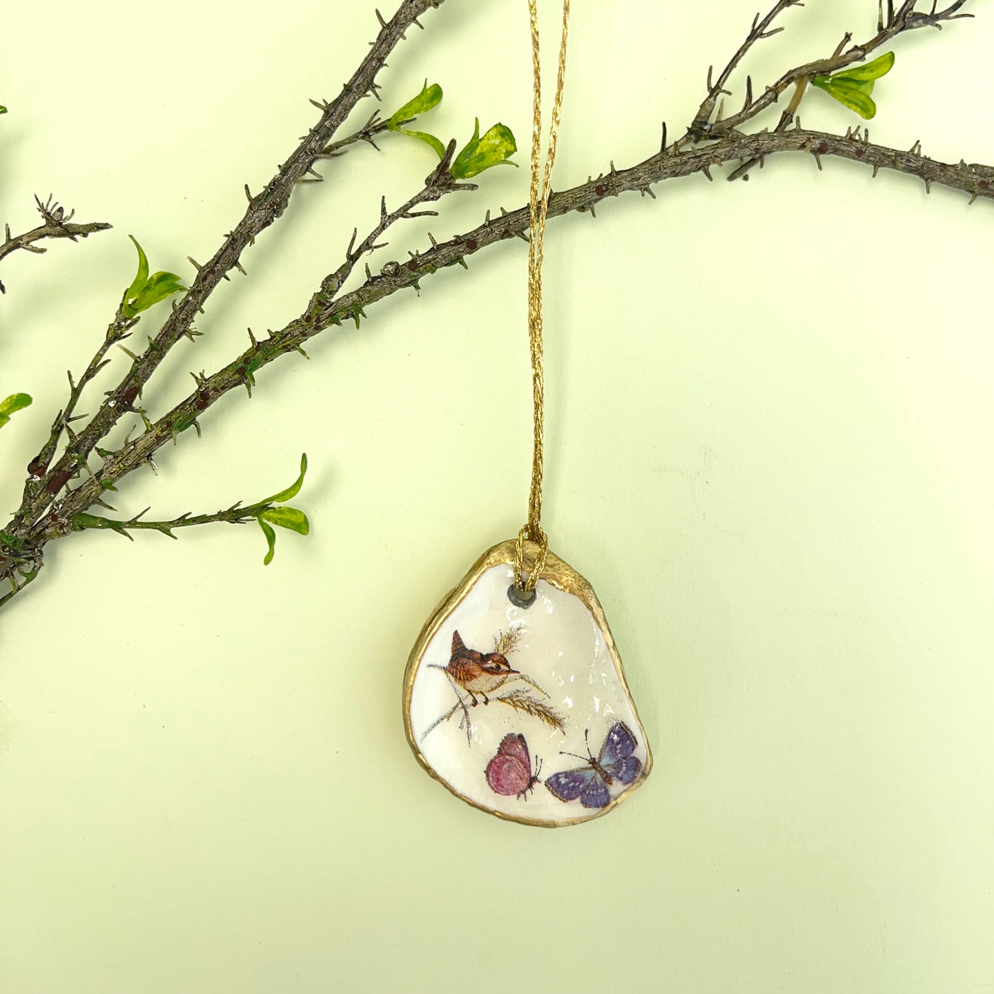 Oyster shell wall hanging - wren and butterflies