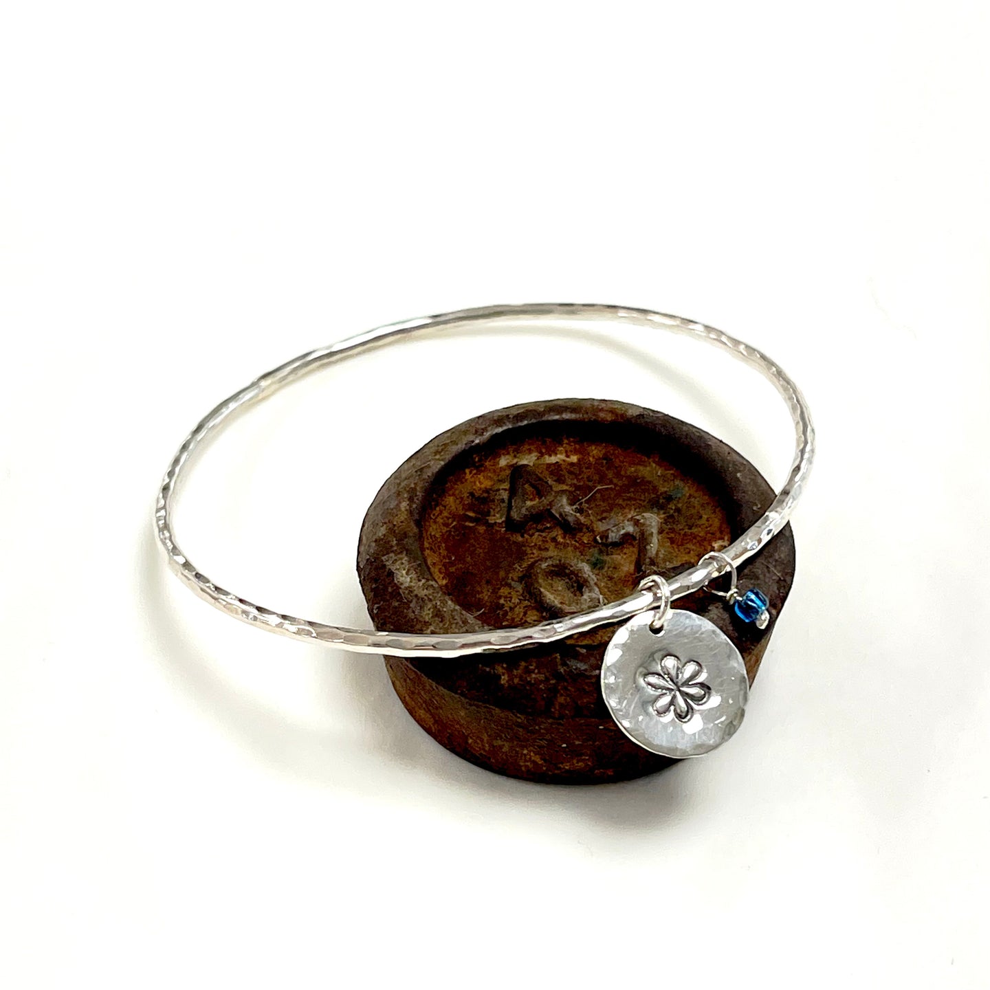 Silver hammered bangle - flower