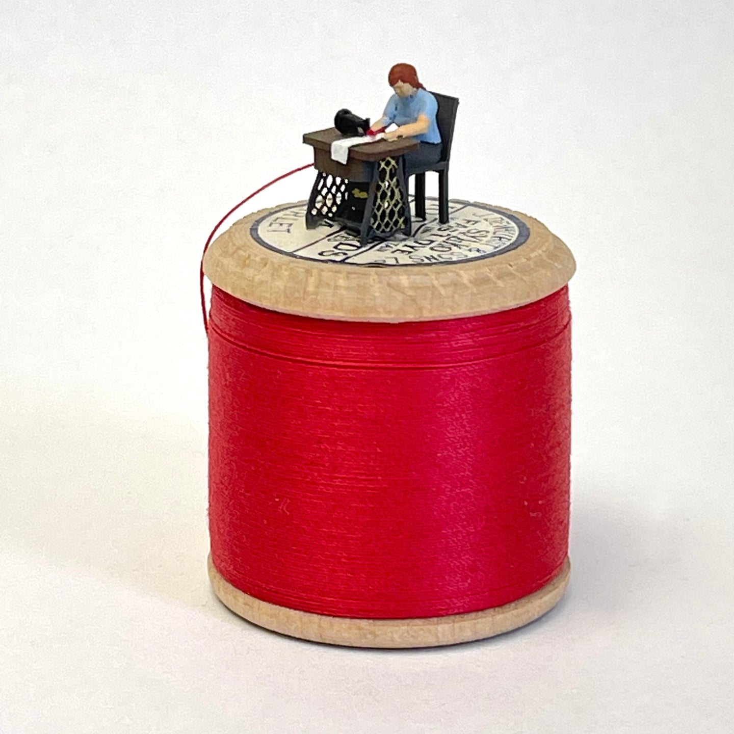 Sewing away miniature sculpture