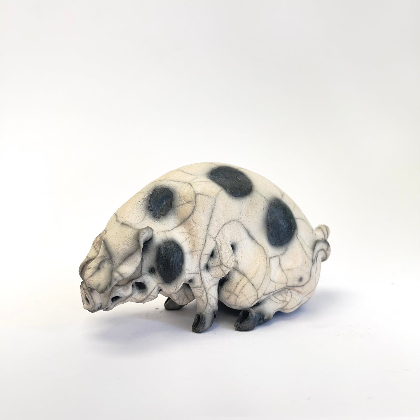 Small sitting old spot ceramic pig - Raku