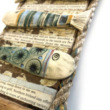Load image into Gallery viewer, Ceramic fishes on wooden plaque
