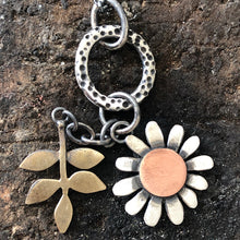 Load image into Gallery viewer, Silver daisy and bronze leaf pendant
