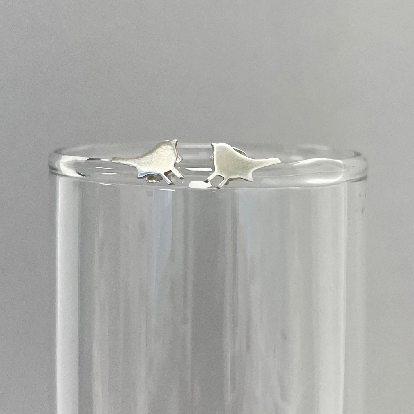 Tiny bird stud earrings