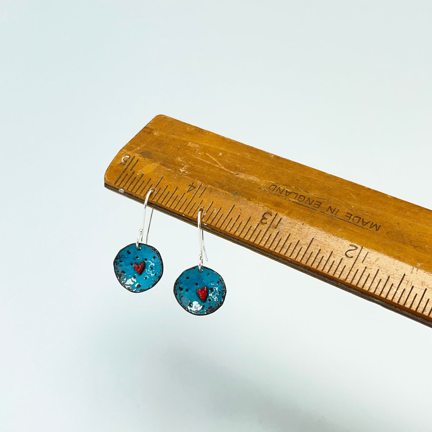 Enamel heart drop earrings - teal / red