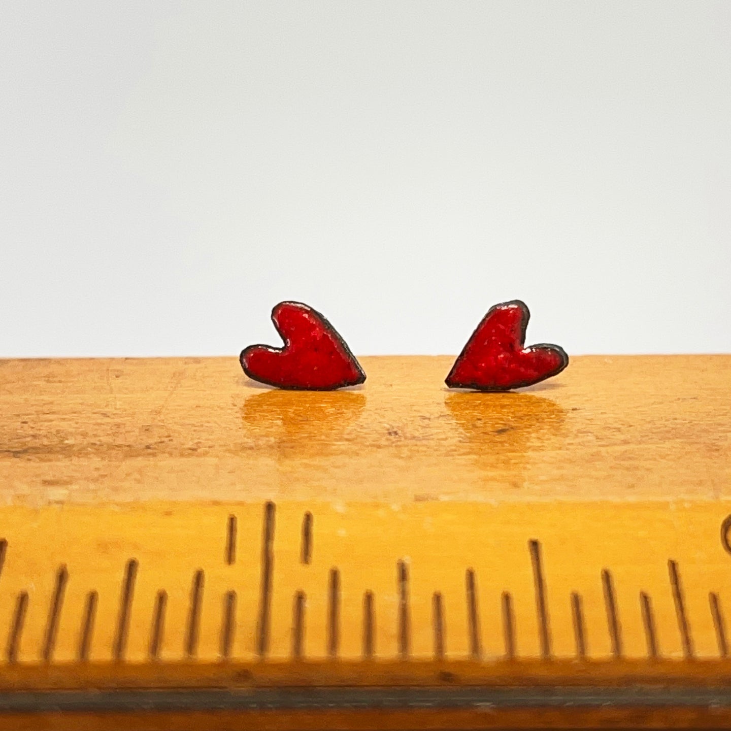 Tiny enamel heart earrings - red