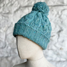 Load image into Gallery viewer, Classic cable pom pom hat - blue
