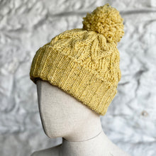 Load image into Gallery viewer, Classic cable pom pom hat - mustard
