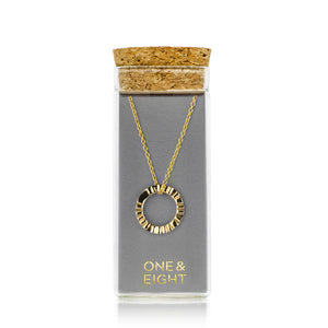 Gold open disc textured necklace