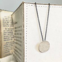 Load image into Gallery viewer, Small silver disk pendant 1
