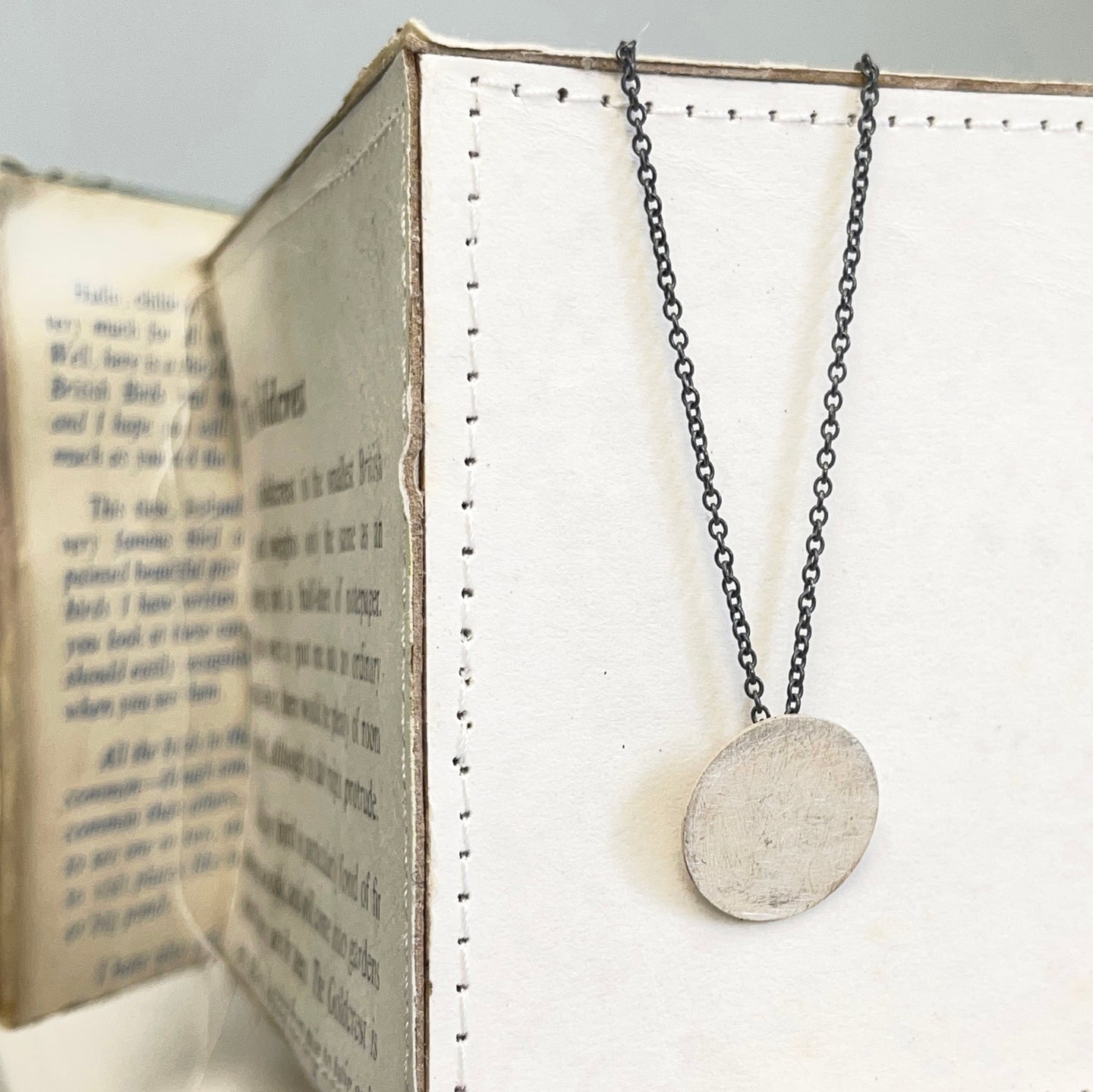 Small silver disk pendant 1