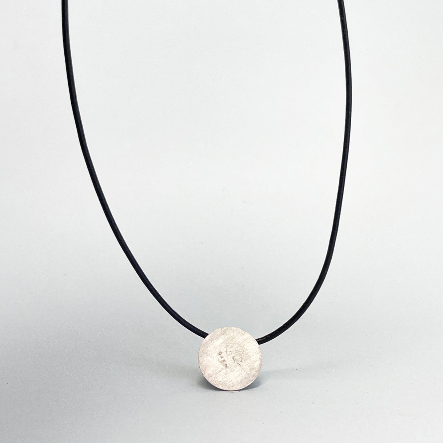 Small silver disk pendant 4